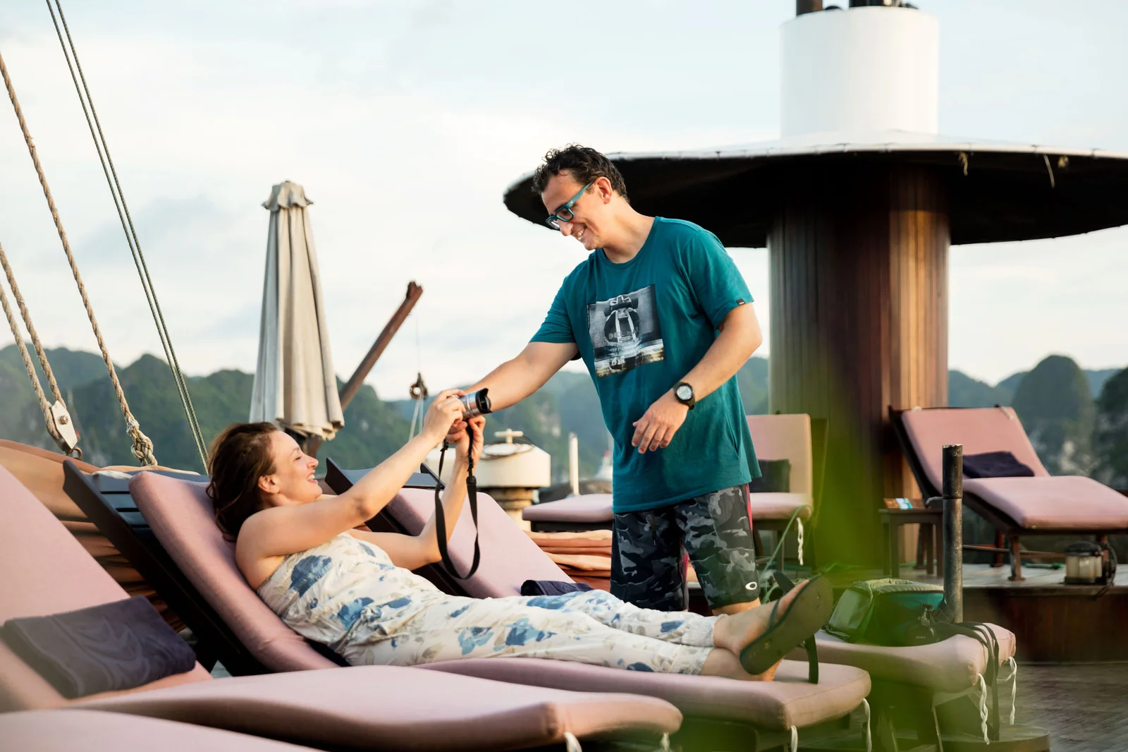 What to Wear on a Halong Bay Cruise: Seasonal Guide 1 Halong bay day cruise sunbathing